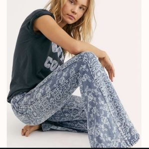 We the Free Patterned Flare Jeans Free People